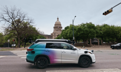 Zoox Toyota Highlander autonomous vehicle side view on street in Austin, Texas