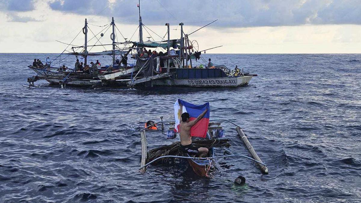 China says it rescued 'personnel' after Philippines collision