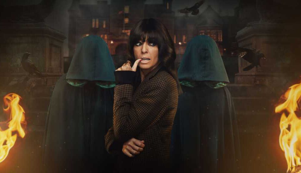 Claudia Winkleman and two Traitors in cloaks