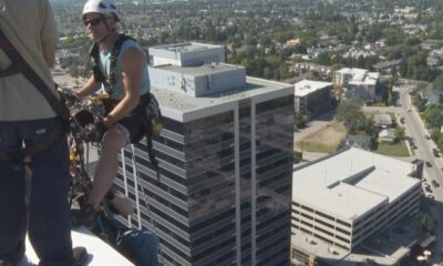 Fearless fundraisers rappel down Kelowna tower for Easter Seals Drop Zone - Okanagan