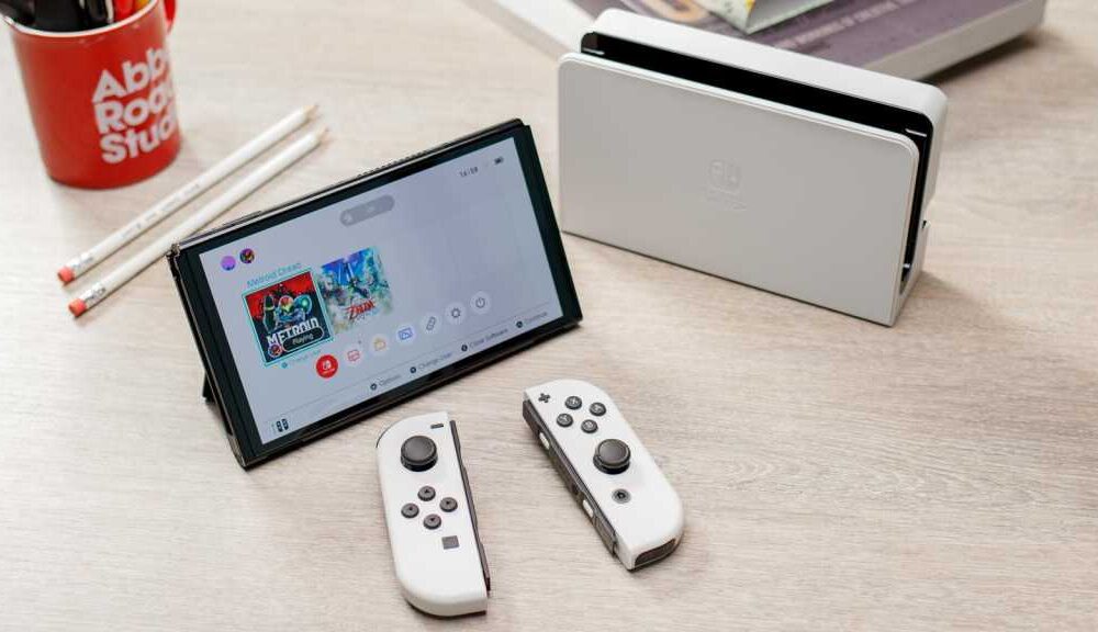 Nintendo Switch OLED in white on a desk