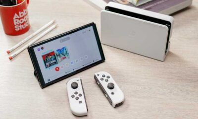 Nintendo Switch OLED in white on a desk