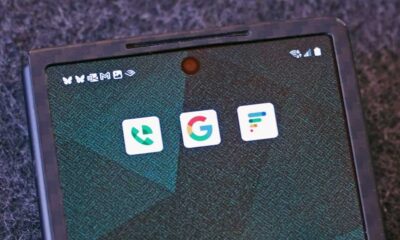 android phone with app logos Google, Google Voice, Google Fi