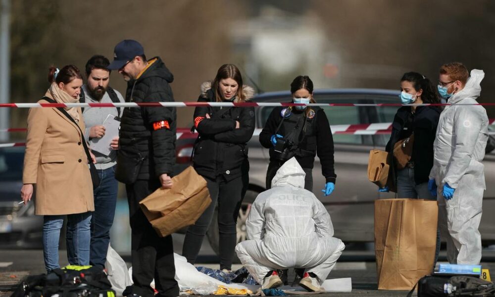 French police say killed man holding knives in Paris region