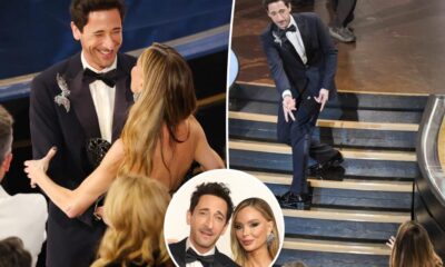 Adrien Brody spits out gum, tosses to Georgina Chapman at Oscars 2025