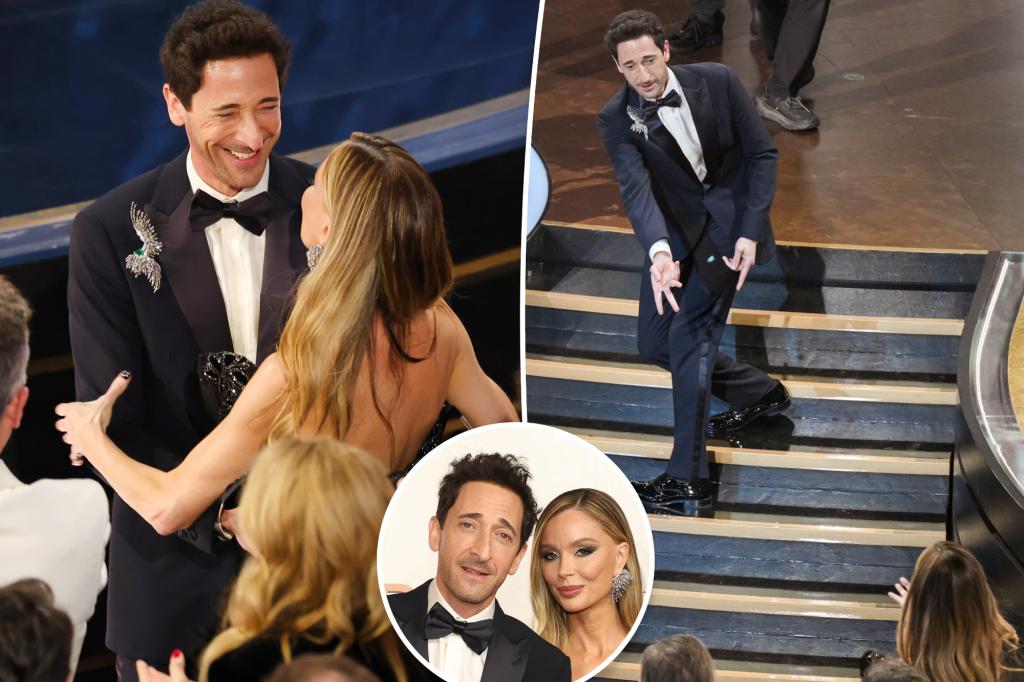 Adrien Brody spits out gum, tosses to Georgina Chapman at Oscars 2025