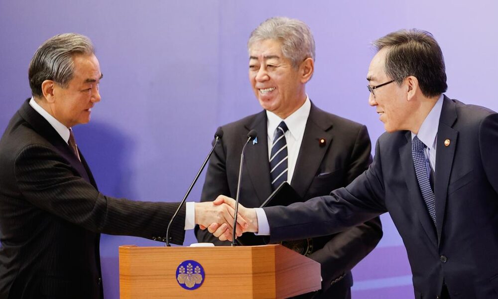 Japan hosts talks with China and South Korea; agrees to promote cooperation