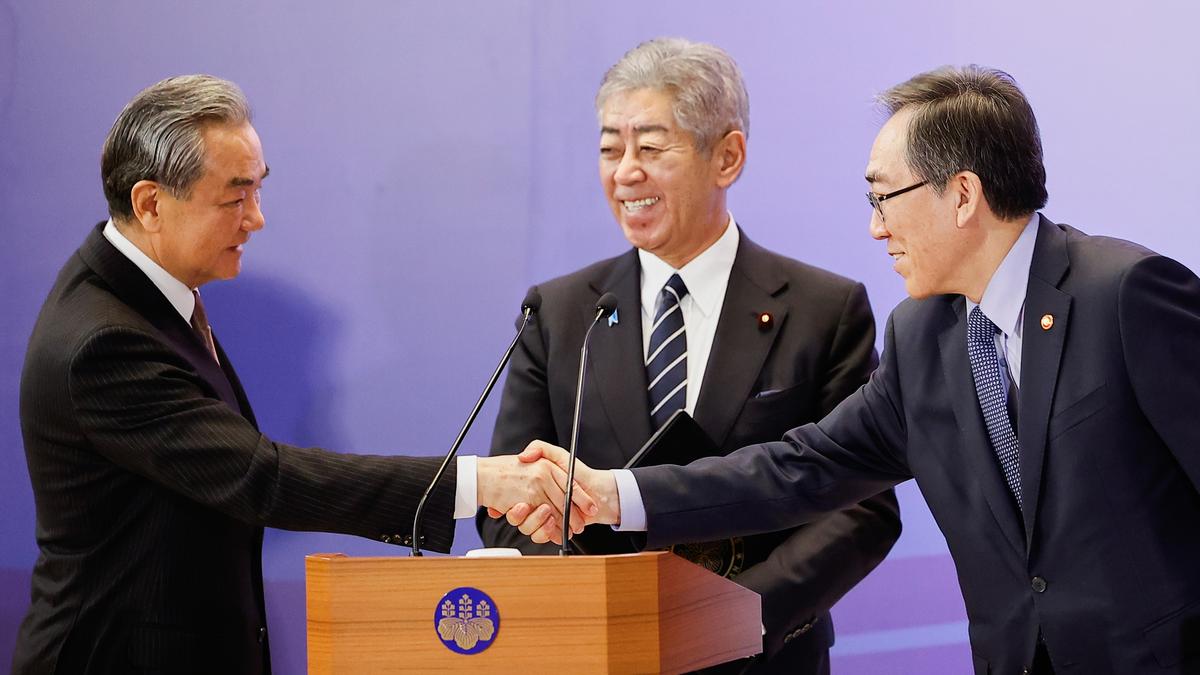 Japan hosts talks with China and South Korea; agrees to promote cooperation