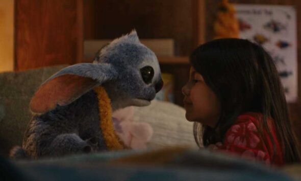 (L-R) Stitch and Maia Kealoha as Lilo in Disney’s live-action LILO & STITCH. Photo courtesy of Disney. © 2025 Disney Enterprises Inc. All Rights Reserved.