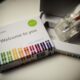 This illustration picture shows a saliva collection kit for DNA testing displayed in Washington DC
