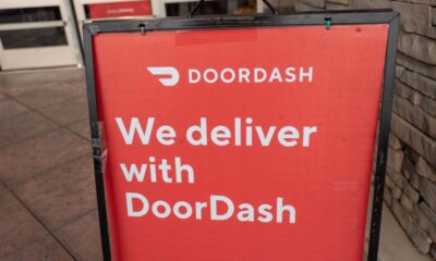 Sign reading We Deliver With Doordash, referencing the Doordash food delivery service, San Ramon, California, September 12, 2020. (Photo by Smith Collection/Gado/Getty Images)