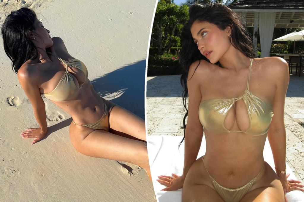 Kylie Jenner soaks up the sun in tiny gold cutout bikini on tropical getaway